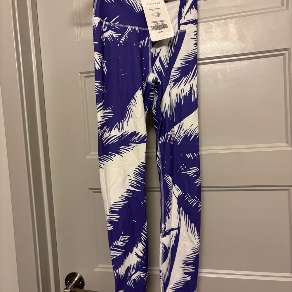 Fabletics purple High Waisted Printed PureLuxe 7/8 leggings.